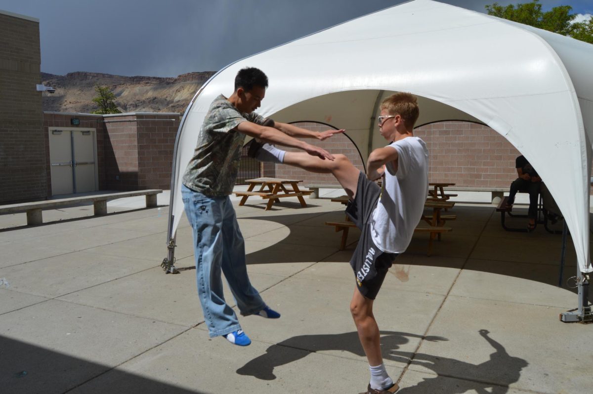 Milo Bhagatram-Jackson and Talan Despain having an epic duel